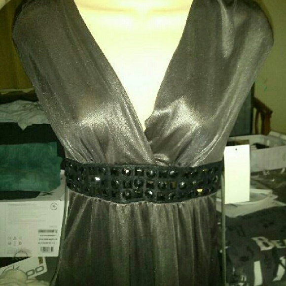 Very sexy too. Shinny goldish color. New with tag