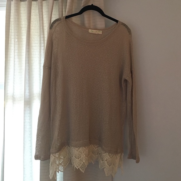 Light pullover sweater with lace embellishment
