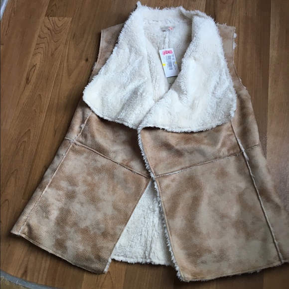Brown vest with fur inside