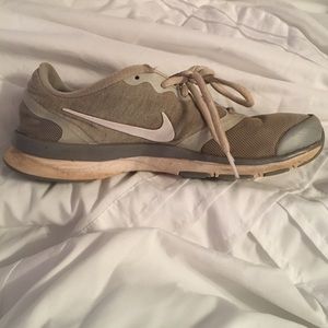 Gray Nike tennis shoes