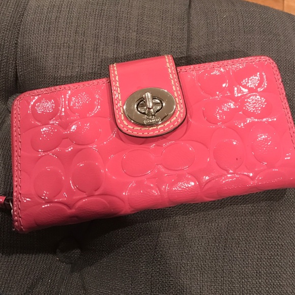 Coach leather monogram wallet in coral