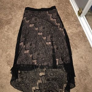Lacy high low skirt with nude lining