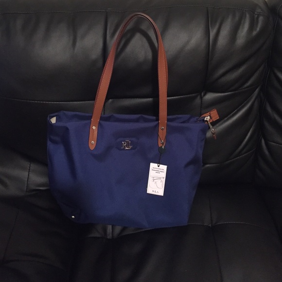 Ralph Lauren Tote with detachable zipper pouch.