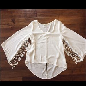 Fringe long sleeve top