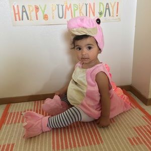 Pink dinosaur costume