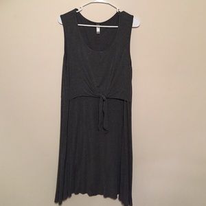 Gray cotton sleeveless dress with a tie waist.