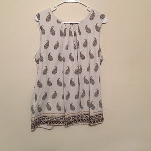 Neutral sleeveless blouse with pleated front