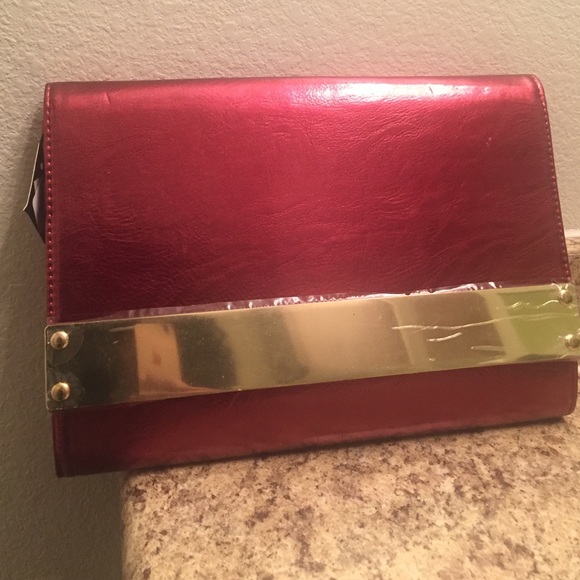 Red metallic clutch with gold band