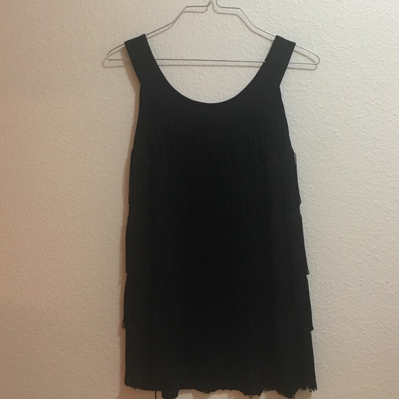 Elegant fringed oval neck top