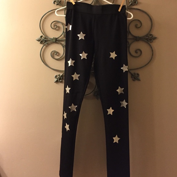 Black leggings with metallic silver stars