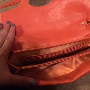 Orange purse.
