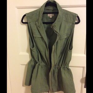 Casual and edgy, army green vest