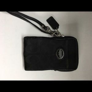 Black coach phone clutch