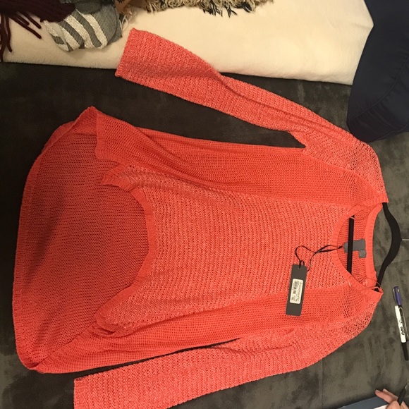 Knotted peach sweater
