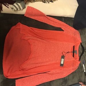 Knotted peach sweater