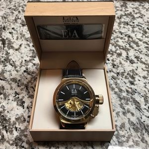 Gold & Black Swiss movement watch