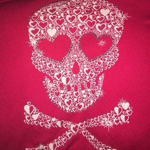 Pink long sleeved sweater.