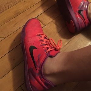 Nike purple and red shoes