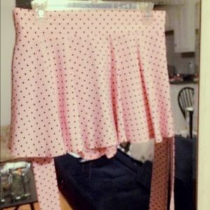 Elastic polkadots skorts in baby pink and black
