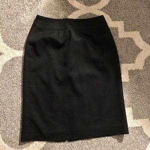 High rise black skirt with a zipper on the back, 2