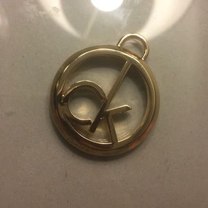 Calvin Klein gold charm