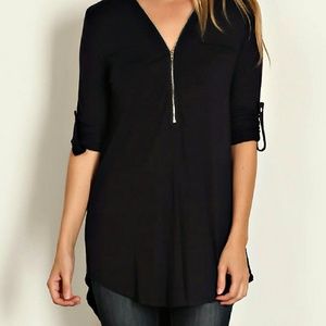 Navy tunic with zipper neckline and shirttail hem
