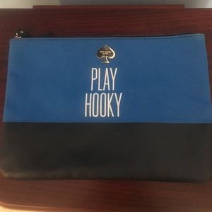 Kate Spade makeup pouch or clutch.