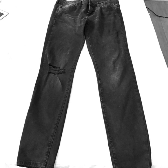 Slightly ripped off black jeans. Brand new