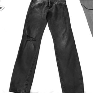 Slightly ripped off black jeans. Brand new