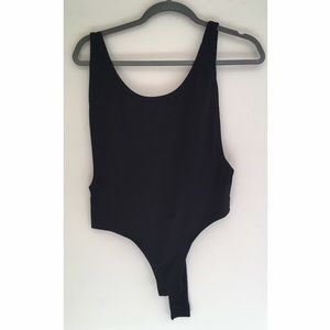 Black high cut bodysuit