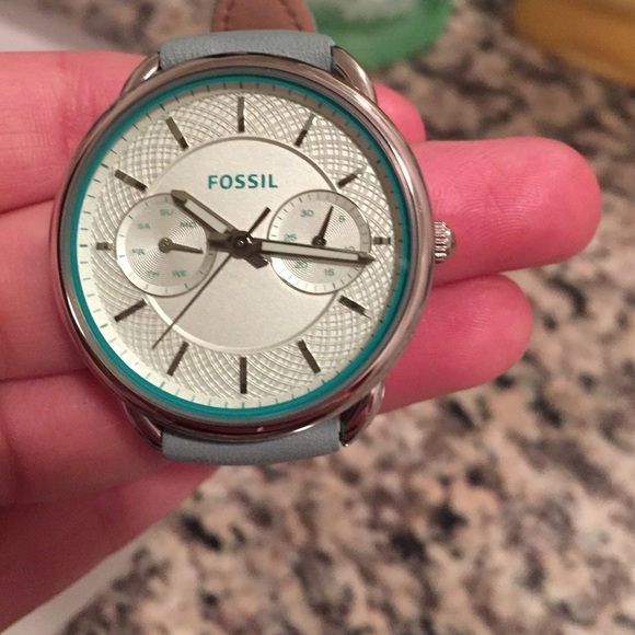 Light green fossil watch