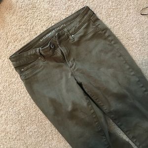 Olive green skinny jeans.