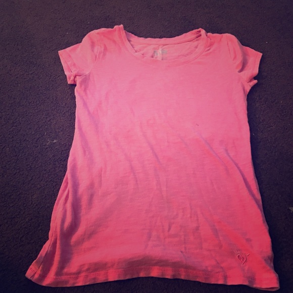 A pink t-shirt size 8
