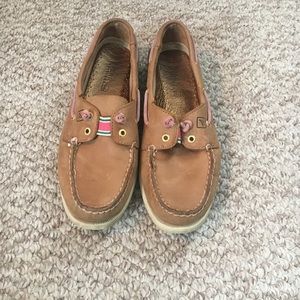 Brown and pink Sperry shoes