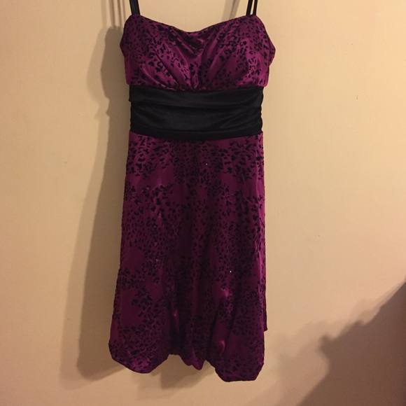 Plum colored dress.