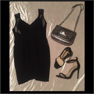 Sexy, mini LBD with mesh insert details on sides.