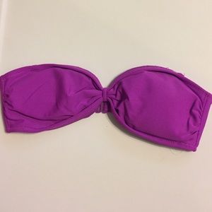 Purple bandeau swim top.