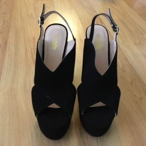 Black suede wedge heels