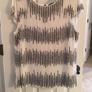 White blouse with black and silver sequins