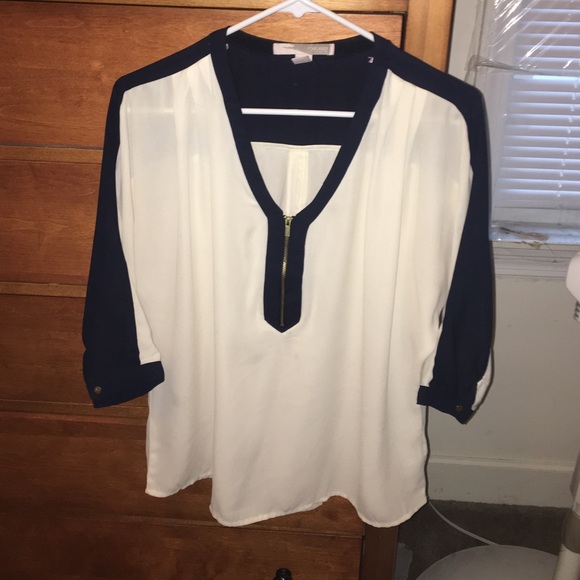 Sheer white and navy shirt with gold zipper