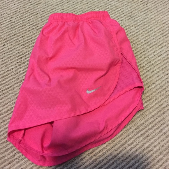 Pink Nike running shorts