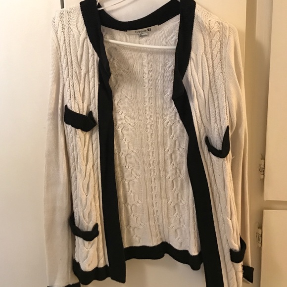 White sweater from forever 21. Black trim. Size s
