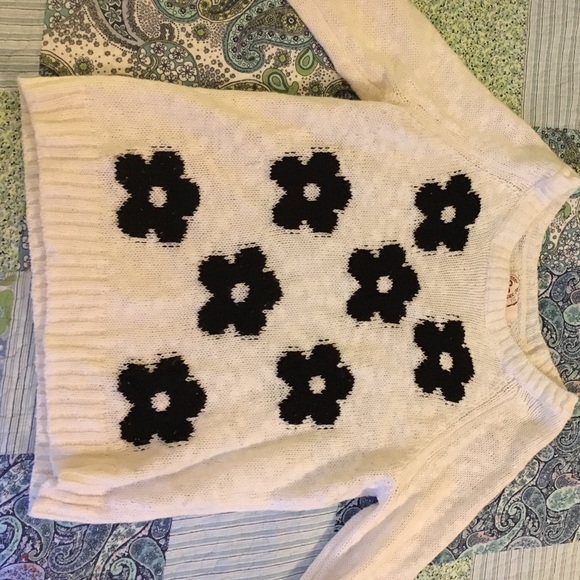 White sweater with black flowers