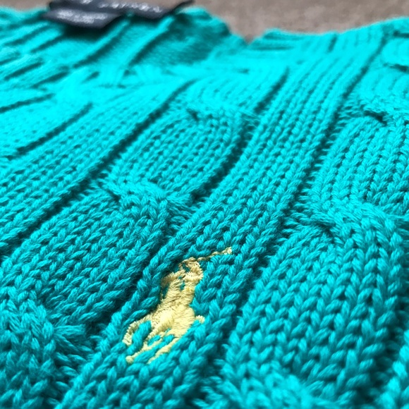 Lightly worn cable knit sweater