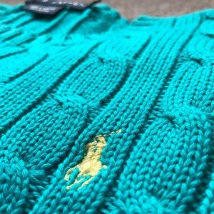 Lightly worn cable knit sweater