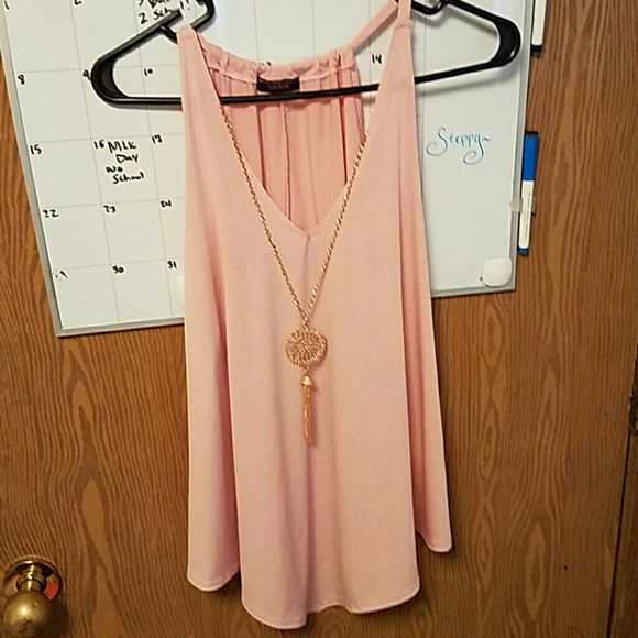 Pink sleeveless blouse
