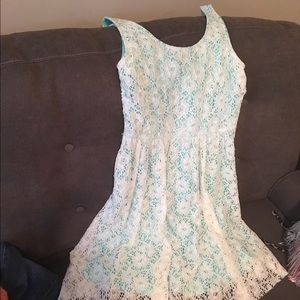 Lace dress with turquoise underlay