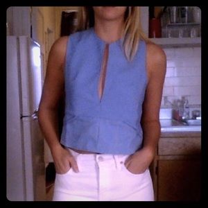 Blue tank top with crisscross back & mesh pockets