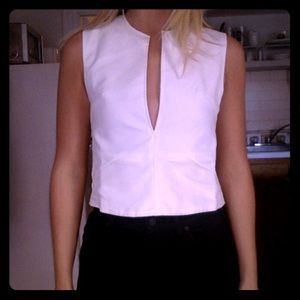 White tank top with crisscross back & mesh pockets