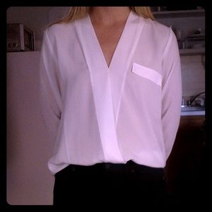 Brand new white blouse with wrap appearance